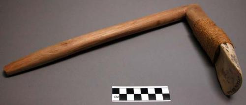 Adze; shell adze with wooden handle.