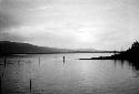 Scene of lake with distant mountains