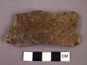 Ceramic body sherd, brown ware, punctate design