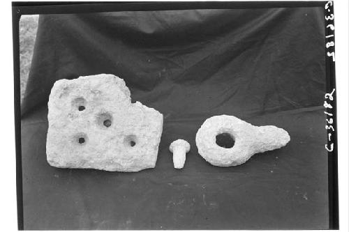 Structure 3 E 3.  Stone artifacts found during excavation.  Catologue numbers, l