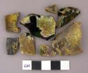 Glass, olive green bottle glass, fragments, oxidized