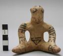 Polychrome pottery figurine