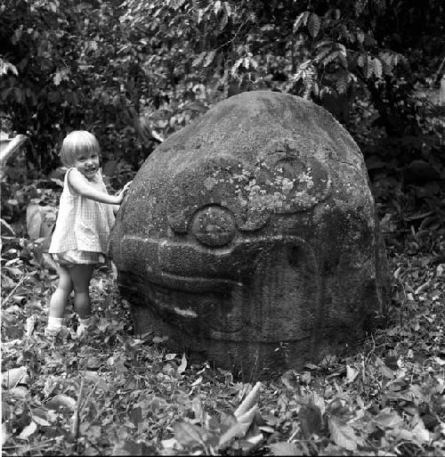 Katy Adams and reptile head sculpture at Sabana Grande