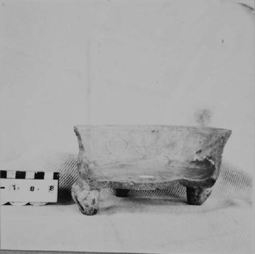 Fragmentary tetrapodal polychrome pottery bowl