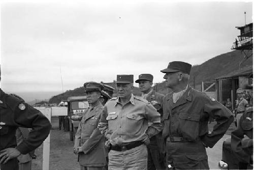 Military men standing together