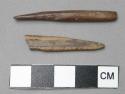 2 bone awls (?) or fish hooks (?)