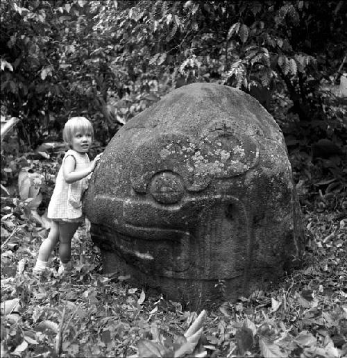 Katy Adams with reptile head sculpture at Sabana Grande