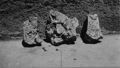 Bottom view of fragments of stucco jaguar from Structure 10