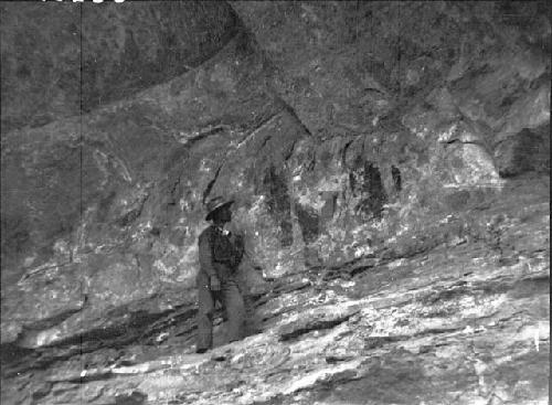 Crew Member By Pictographs Near Site on West Wall of Canyon