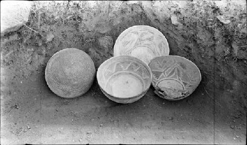 4 Bowls, Nested and Lying on the Floor in the NE Corner of Room 108