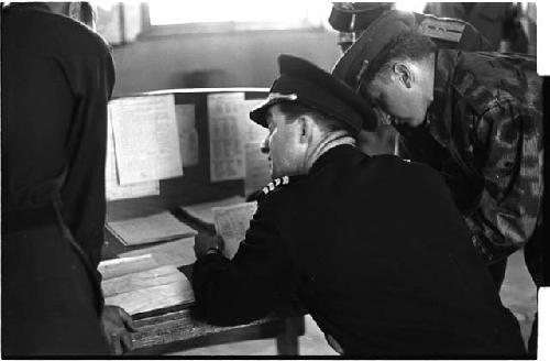 Military Officer reading documents