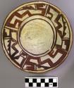 Bowl, polacca polychrome style c. int: linear design; ext: slipped, no design. 4