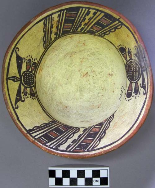 Bowl, polacca polychrome style c. int: linear design; ext: slipped, no design. 7