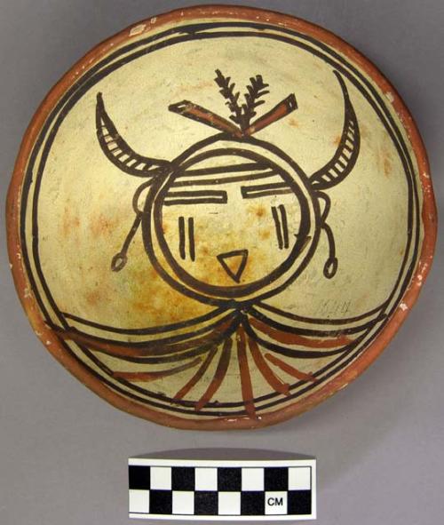 Bowl, polacca polychrome style c. int: kachina design; ext: slipped, no design.