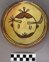 Bowl, polacca polychrome style c. int: kachina design; ext: slipped, no design.