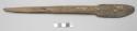 a) one blade-shaped wooded batten; b) one spear-shaped batten
