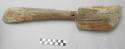 Large wooden digging stick with club like formation on one end