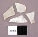 Glass, white bottle glass, fragments