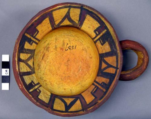 Ladle, polacca polychrome style c. int: linear design. ext: slipped, no design.