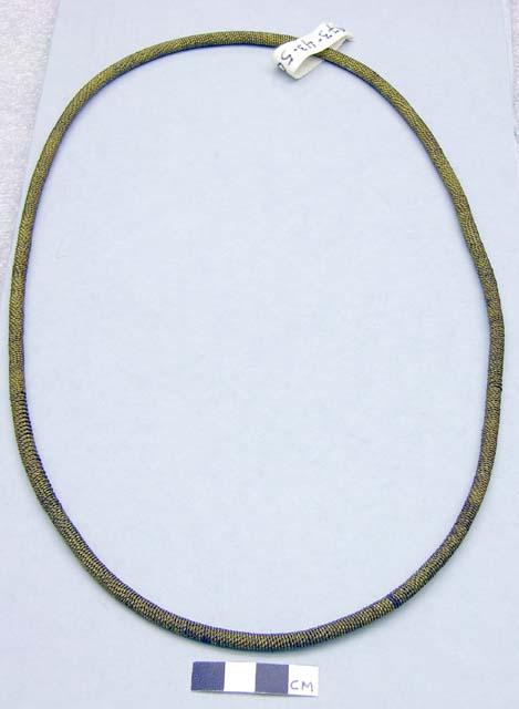 Brass necklaces, a) 25 x 0.25 in.; b) 24 x 0.25 in.