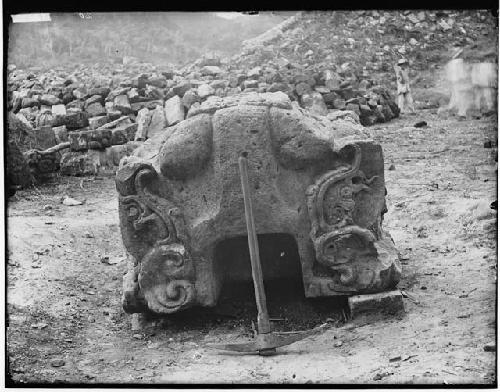 Sculpture with pickaxe for scale