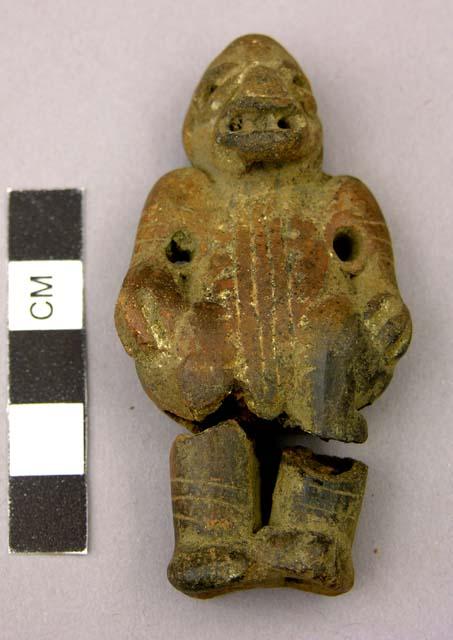 Pottery whistle - grotesque human form