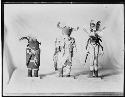 Three Kachina dolls
