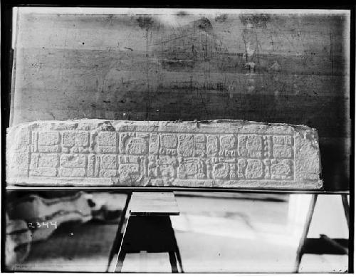 Hieroglyphic inscription on front edge of lintel from ruined building