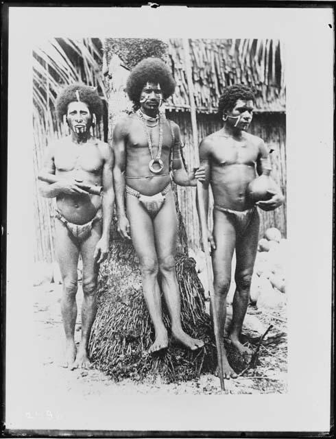 Three young men with personal gear