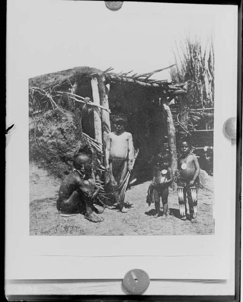 Children in front of hut