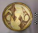 Bowl, polacca polychrome style c. int: zuni rain bird design; ext: slipped, no d