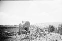 Woman standing in front of monolith