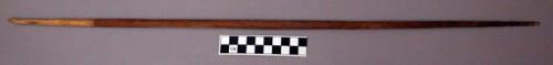 Unclassified tool, carved wood dowel, one end tapered to point, other broken