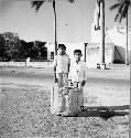 Fragment of sculptured column with two local boys for scale.