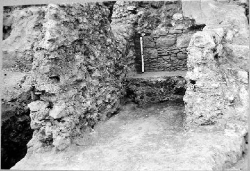 A-V: Terrace wall connected with Period II stairway leading up to Room 19.  Pict