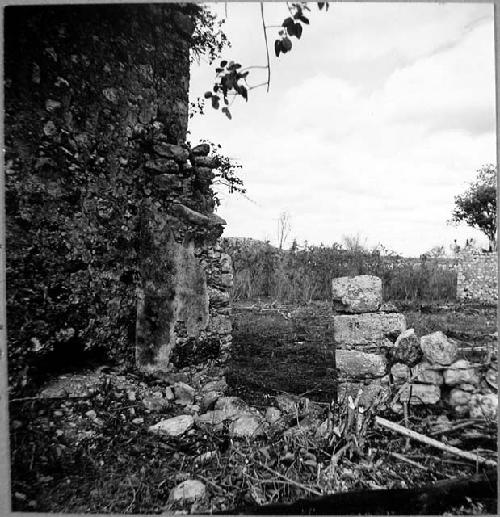 Doorway in atrio wall just north of Casa 2, Casa 2 to left, Casa 3 in background