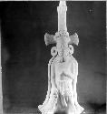 Ceramic figurine, standing male with headdress and cape