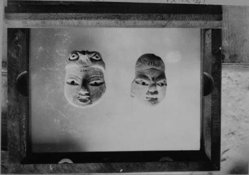 Figurine heads: Nos. 220, 199