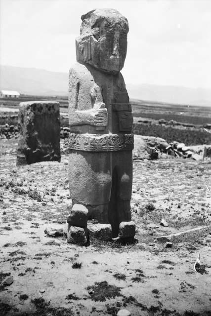 Stone anthropomorphic sculpture