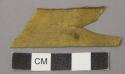 Palm leaf fragments, one with notch cut end