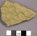 One sherd with circular impressions on exterior