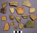 Seventeen potsherds, some painted