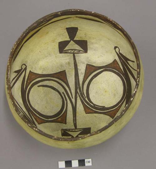 Bowl, polacca polychrome style c. int: zuni rain bird design; ext: slipped, no d