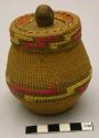 Small spruce root basket with rattle cover and embroidered design