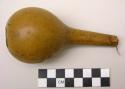 Gourd container for holding red powder, a narrow spout.