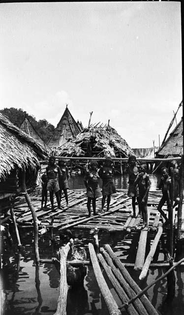 Women and children on dock