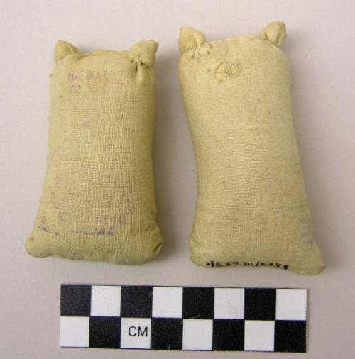 2 miniature white bags of flour for doll called egego - used in ceremonies