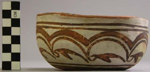 Bowl, polacca polychrome style c. int: splatter design; ext: zuni rain bird desi