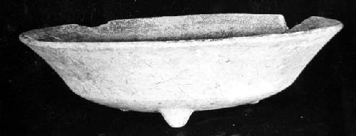 Ceramic tripod bowl, conical legs, sherds missing from rim