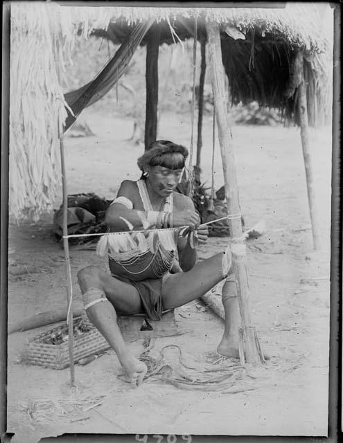 Chief Yufana making headdress